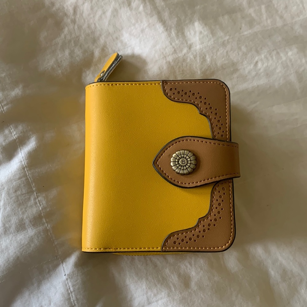 Yellow leather Bostanten wallet with brown detailing.(4” by 4.5”)